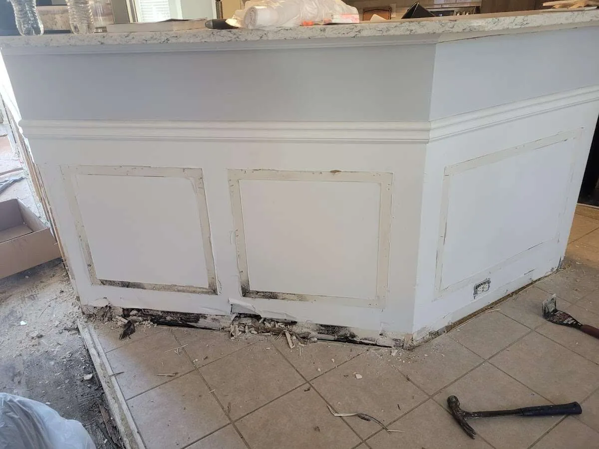 Water damage and mold on kitchen during Storm Damage Restoration in Inwood